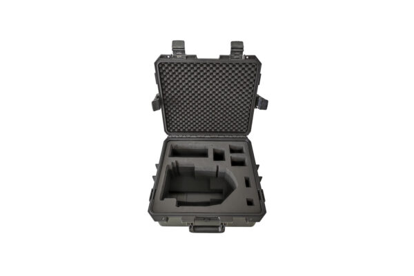 Valise de transport ouverte avec compartiments en mousse.